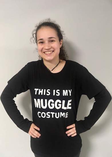 Audray Theroux wearing a t-shirt that says 'This is my Muggle Costume'